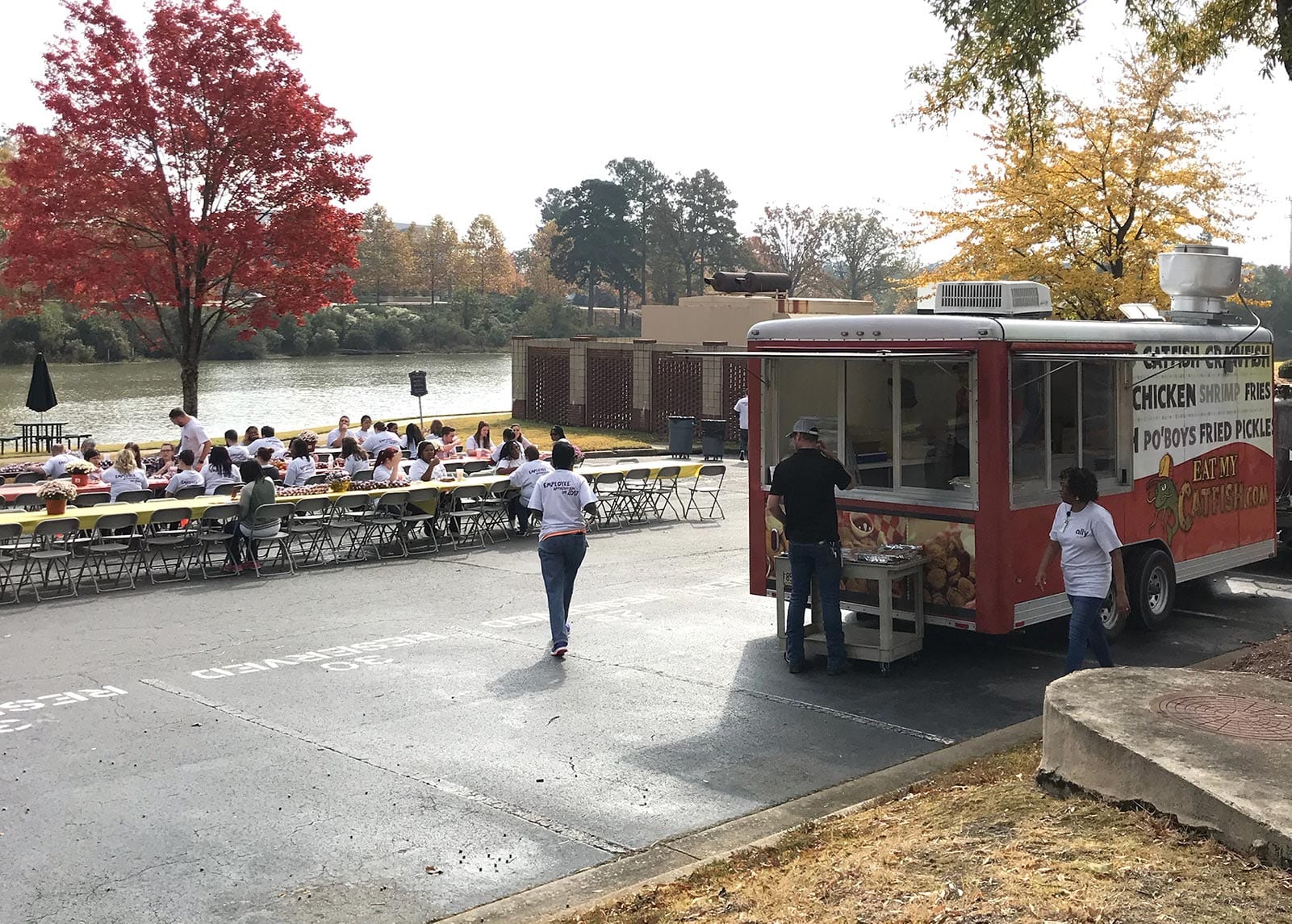 people eating by emc food truck